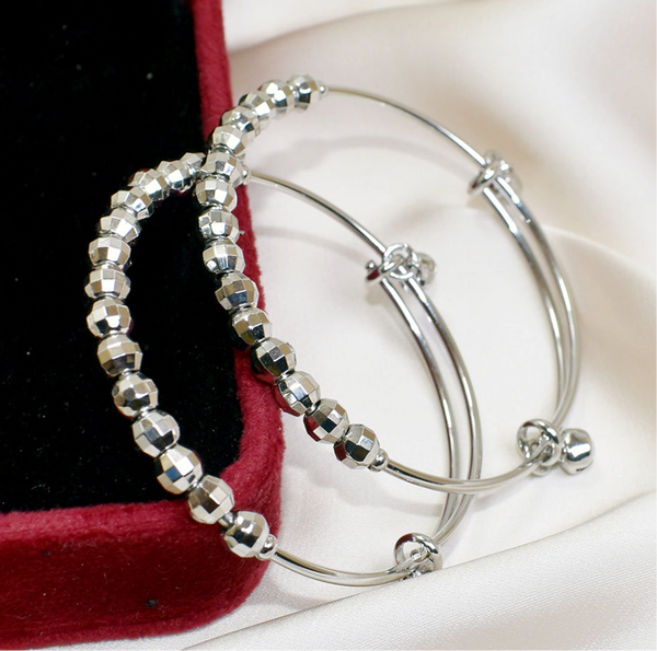 Two Silver Bangles: Timeless Elegance and Style