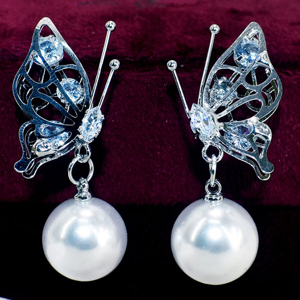 Butterfly Whimsy: Pearl Silver Jhumka Earrings