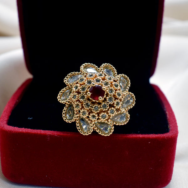 Blossom Radiance: Flower-Shaped Red Stone Ring with White Stone Encirclement