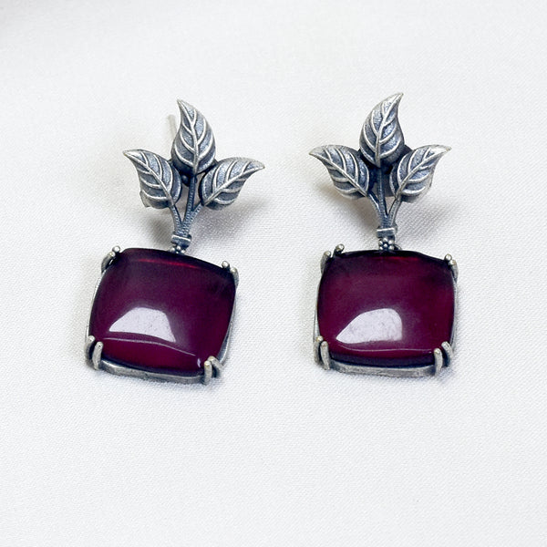 Artistic Flair: Designer Leaf Earrings with Red Stone