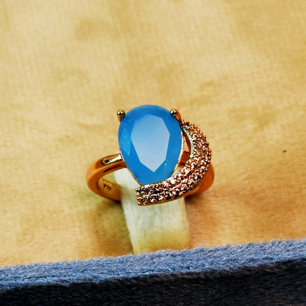 Lunar Glow: Blue Stone Crescent Zircon Ring